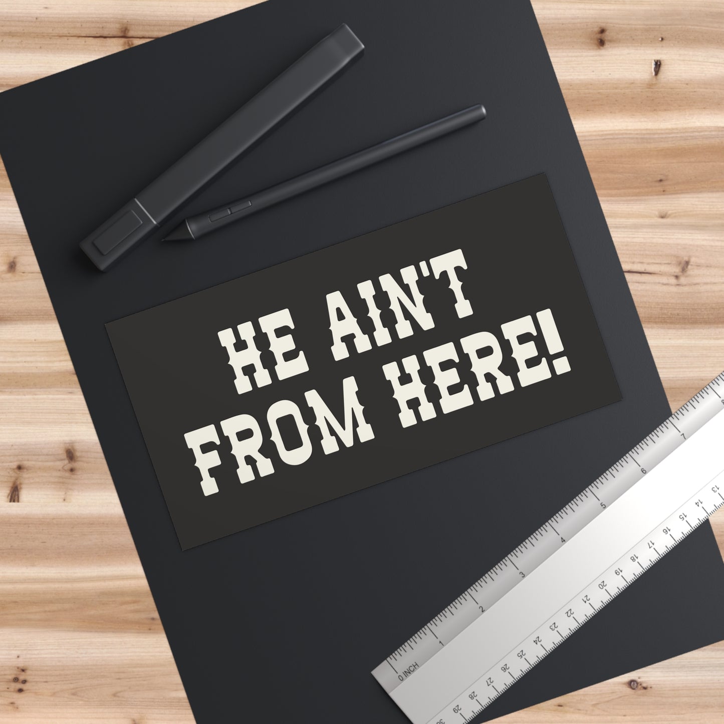 He Ain't From Here Bumper Sticker